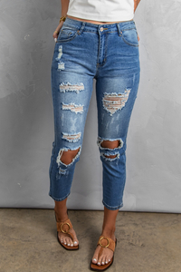 Calça jeans cropped Stockpapa Sky Blue desbotada com buracos desgastados